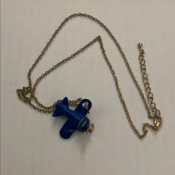 Vintage Jewelry - Vintage 1” blue painted metal propeller airplane on gold tone 18-20” chain